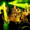Bandauftritt mit grünem Licht bei einem Konzert